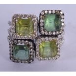 AN 18CT WHITE GOLD PERIDOT AND DIAMOND RING. N/O. 13 grams.