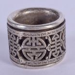 A CHINESE SILVER ARCHERS RING. 39 grams. 3 cm diameter.