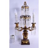 A MID 19TH CENTURY FRENCH BRONZE CRYSTAL DROP CANDLE STICK LAMP. 53 cm x 26 cm.