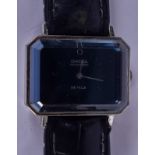 A RARE OMEGA AUTOMATIC DE VILLE BLACK DIAL WRISTWATCH. 3 cm x 2.75 cm.