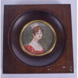 AN EARLY 20TH CENTURY CONTINENTAL PAINTED IVORY PORTRAIT MINIATURE depicting a female. Image 6.25 cm