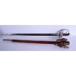 A HENRY WILKINSON STEEL HANDLED SWORD with leather mounts. 94 cm long.