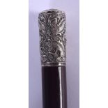A 19TH CENTURY CHINESE SILVER MOUNTED LACQUERED WALKING CANE. 82 cm long.
