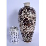 A CHINESE QING DYNASTY CHIZOU POTTERY VASE painted with brown floral sprays. 29 cm high.