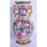 A 19TH CENTURY CHINESE CANTON FAMILLE ROSE VASE Qing. 24 cm high.