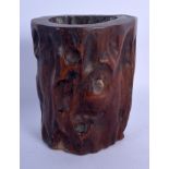 A GOOD 18TH CENTURY CHINESE CARVED HARDWOOD BRUSH POT Qing, of naturalistic form. 14 cm x 12 cm.