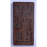 A VINTAGE TREEN BISCUIT MOULD. 30 cm x 15 cm.