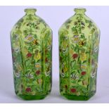 A SMALL PAIR OF LATE 19TH CENTURY CONTINENTAL ENAMELLED GLASS BOTTLES painted with birds. 9 cm high.