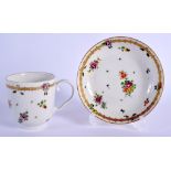 18th c. Bristol chocolate cup and saucer painted with flowers and a chainlike border. Saucer 13cm di