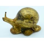 A gilded metal snail 12 x 8cm