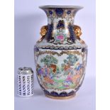 A CHINESE TWIN HANDLED PORCELAIN VASE 20th Century, decorated with European subjects. 36 cm x 19 cm.