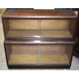 A wooden two shelf glass fronted cabinet 91 x 78cm.