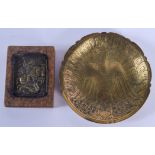 AN EARLY 20TH CENTURY INDIAN BRASS DISH together with an early icon plaque. Largest 12.5 cm wide. (2