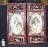 A Framed pair of Chinese porcelain panels decorated with birds and foliage 80 x 37cm. (2)