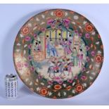 A LARGE CHINESE FAMILLE ROSE PORCELAIN CHARGER 20th Century, decorated with figures and interiors. 4