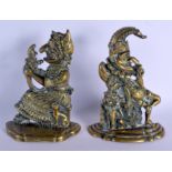 A PAIR OF VICTORIAN BRONZE PUNCH AND JUDY DOOR STEPS. 29 cm x 15 cm.