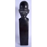 AN AFRICAN CARVED HARDWOOD FIGURE OF A MALE. 34 cm high.
