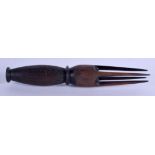 A POLYNESIAN TRIBAL HARDWOOD PRONGED FORK. 30 cm long.