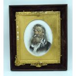 A framed painted porcelain plaque of a Victorian gentleman . 24 x 19cm.