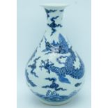 A Chinese blue and white Yuhuchunping vase decorated with dragons 32cm.