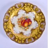 Royal Worcester fine yellow ground plate painted with fruit by John Freeman, date code for 1957. 23
