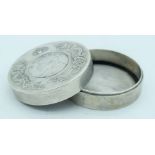 A Chinese small white metal coin box embossed with dragons 7.5 cm.