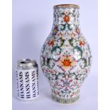 AN EARLY 20TH CENTURY CHINESE FAMILLE ROSE PORCELAIN BALUSTER VASE Late Qing/Republic, bearing Qianl