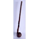 AN UNUSUAL POLYNESIAN CARVED TRIBAL HARDWOOD CLUB of pipe like form with entwined shaft. 52 cm long.