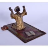 A 19TH CENTURY AUSTRIAN COLD PAINTED BRONZE FIGURE OF AN ARABIC MALE modelled praying. 15 cm x 8 cm.