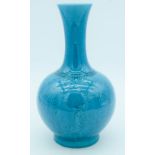 A Chinese Turquoise ground dragon vase 24cm.