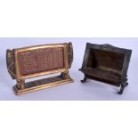 AN ANTIQUE SECESSIONIST MOVEMENT BRONZE DESK CALENDAR together with a matching bronze ashtray. Large