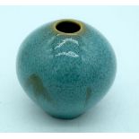 A small Japanese glazed pottery vase 8cm .