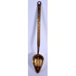 A MIDDLE EASTERN ISLAMIC GOLD INLAID STEEL SPOON decorated with foliage and script. 42 cm long.