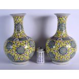 A LARGE PAIR OF CHINESE FAMILLE ROSE PORCELAIN BULBOUS VASES 20th Century. 38 cm high.