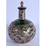 AN UNUSUAL LATE 19TH CENTURY CHINESE SILVER MOUNTED GREEN GLASS BOTTLE decorated with dragons. 17.5