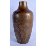 AN EARLY 20TH CENTURY JAPANESE MEIJI PERIOD BRONZE VASE decorated with landscapes. 30 cm high.
