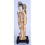 A LATE 19TH CENTURY CHINESE CARVED IVORY IMMORTAL Qing, modelled holding a bamboo pole. Ivory 18.5 c