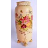 Royal Worcester four footed vase with short pierced neck painted with flowers on a blush ivory groun
