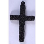 AN ANTIQUE IRISH BOG OAK CROSS. 10 cm x 5.5 cm.