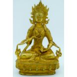 A Chinese Tibetan gilt bronze Buddha 20cm.