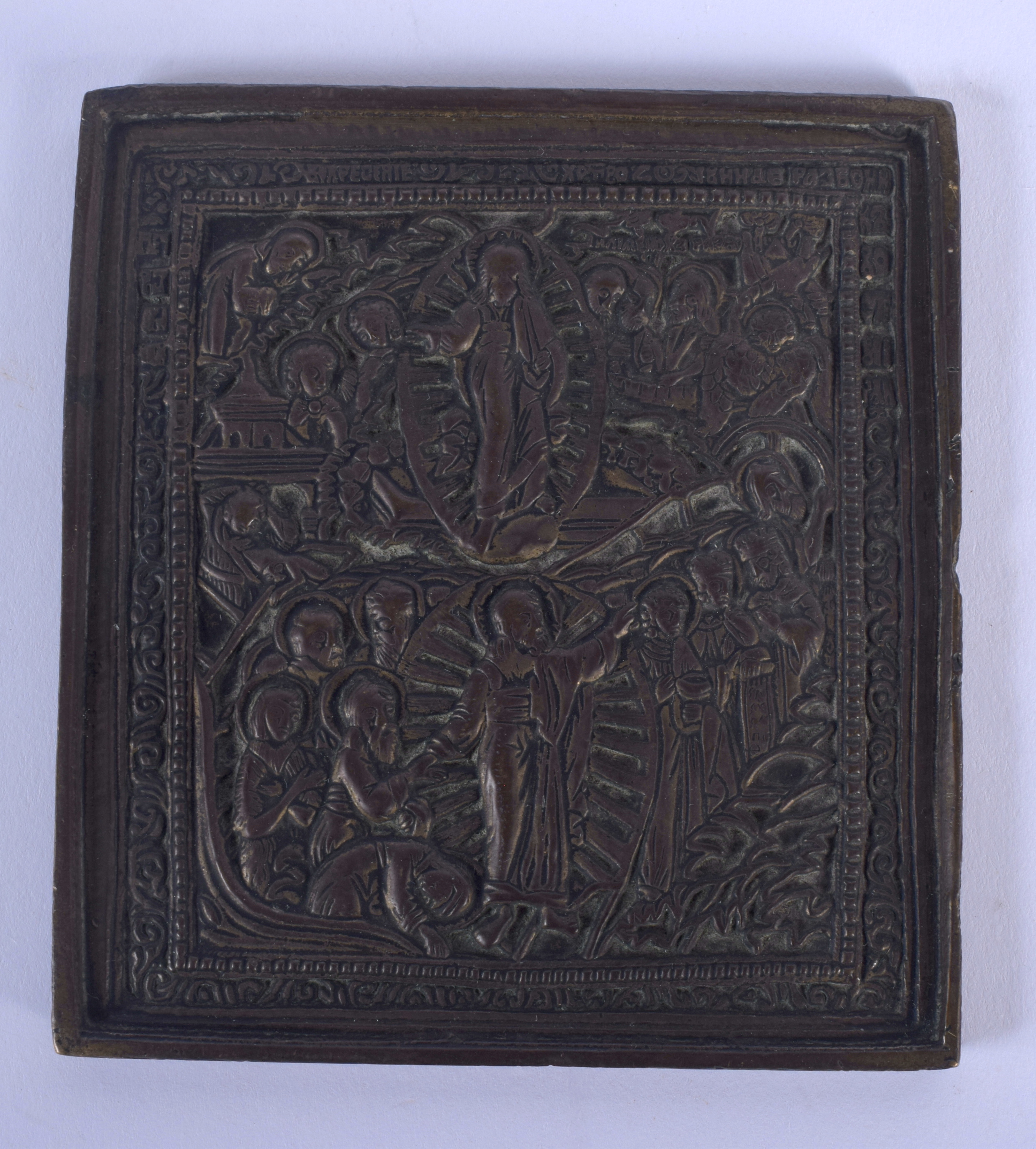 AN 18TH CENTURY RUSSIAN BRONZE SQUARE FORM ICON decorated with saints. 8.5 cm square.