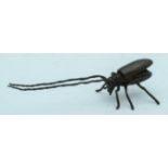 A Japanese bronze figure of a beetle with antennae 14cm.