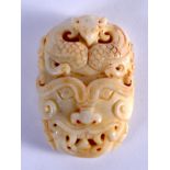 A CHINESE CARVED ARCHAIC JADE MASK HEAD SLIDING BELT BUCKLE 20th Century. 8.5 cm x 5.5 cm.
