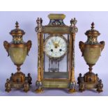 A LATE 19TH CENTURY FRENCH CHAMPLEVE ENAMEL AND ONYX CLOCK GARNITURE decorated with foliage and vine