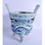 A CHINESE BLUE AND WHITE TWIN HANDLED PORCELAIN CENSER 20th Century, painted with dragons and foliag
