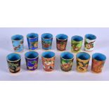 TWELVE CHINESE CLOISONNE ENAMEL THIMBLES 20th Century. 2.75 cm high. (12)