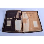 A 1930S ART DECO TRAVELLING LEATHER DOCUMENT FOLDER. 24 cm x 21 cm.