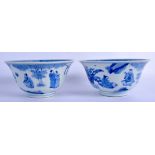 A PAIR OF CHINESE BLUE AND WHITE PORCELAIN BOWLS 20th Century, Kangxi style, painted with figures wi
