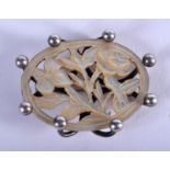 AN ANTIQUE SILVER MOTHER OF PEARL BROOCH. 5 grams. 3.5 cm x 3 cm.