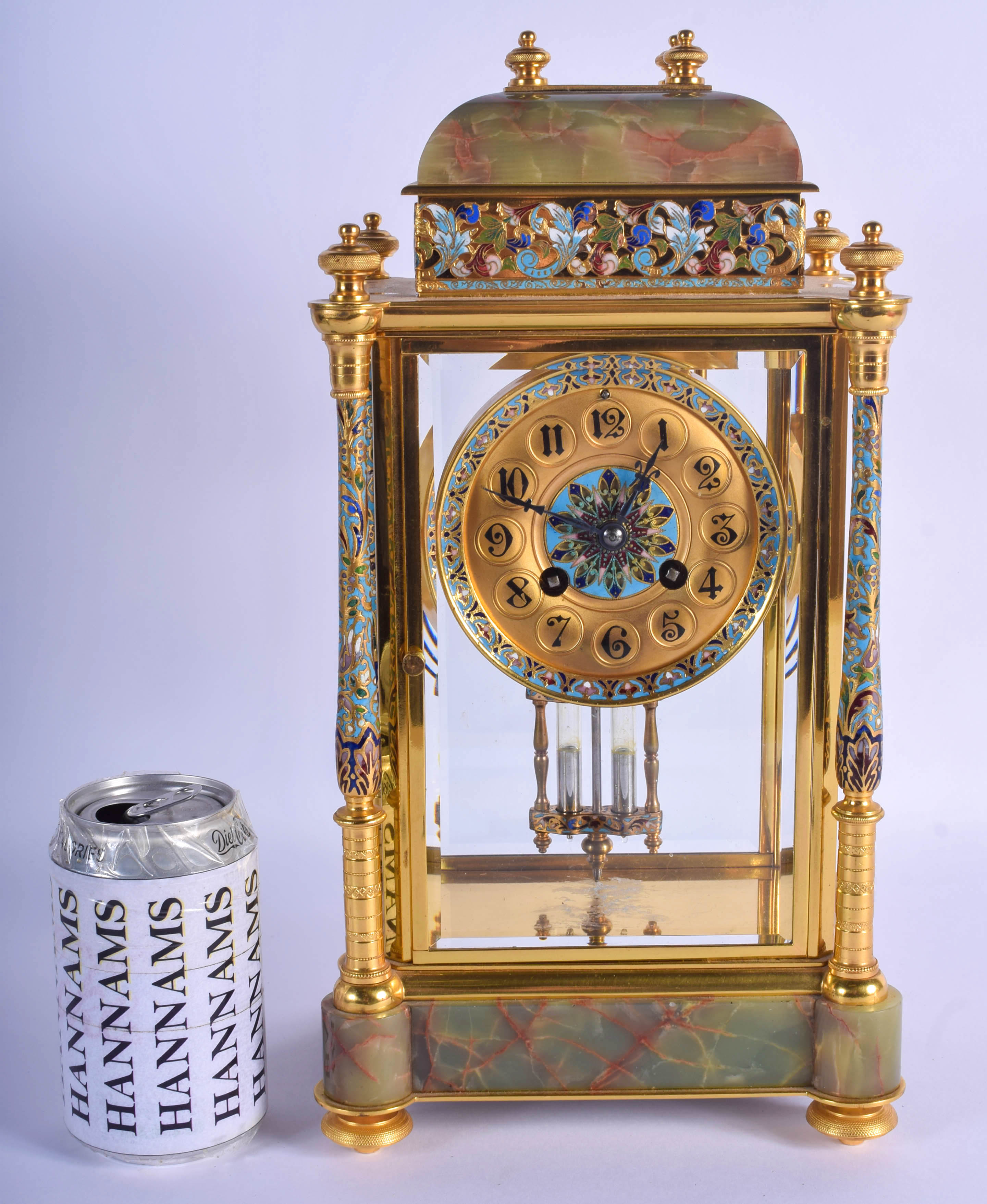 A 19TH CENTURY FRENCH CHAMPLEVE ENAMEL AND ONYX REGULATOR MANTEL CLOCK decorated with foliage. 35 cm